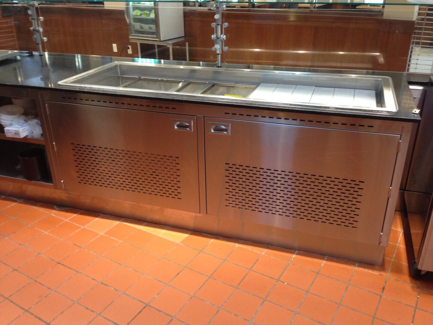 View of the kitchen platform with steel sink area
