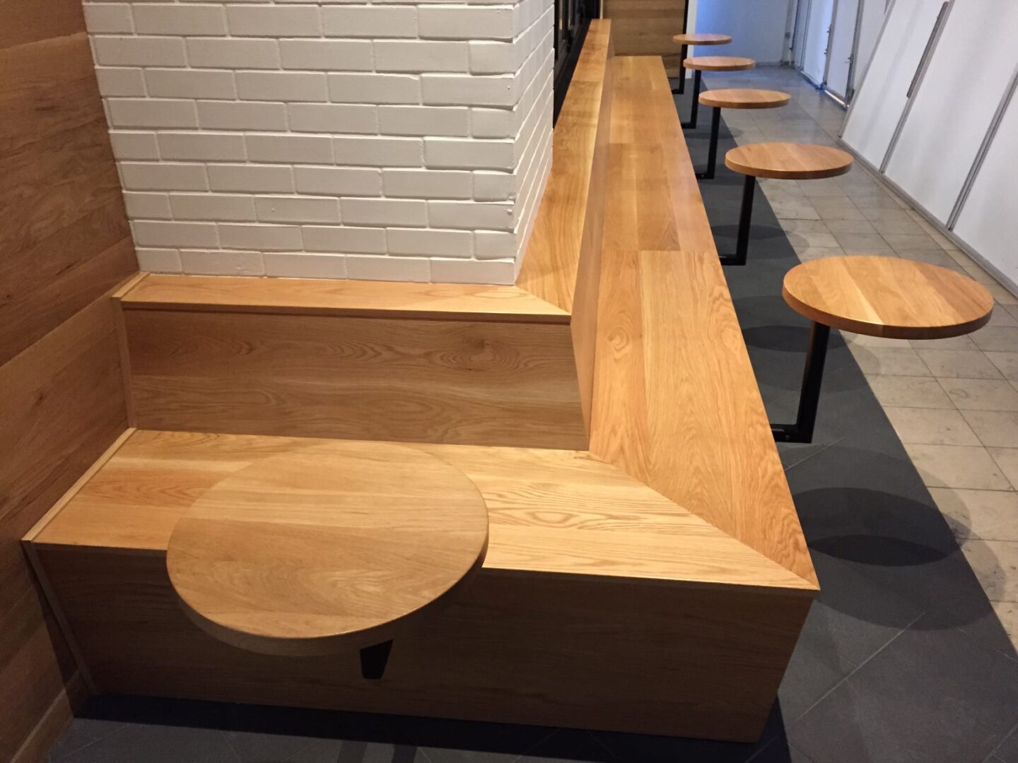 A Table With Attached Benches for Seating
