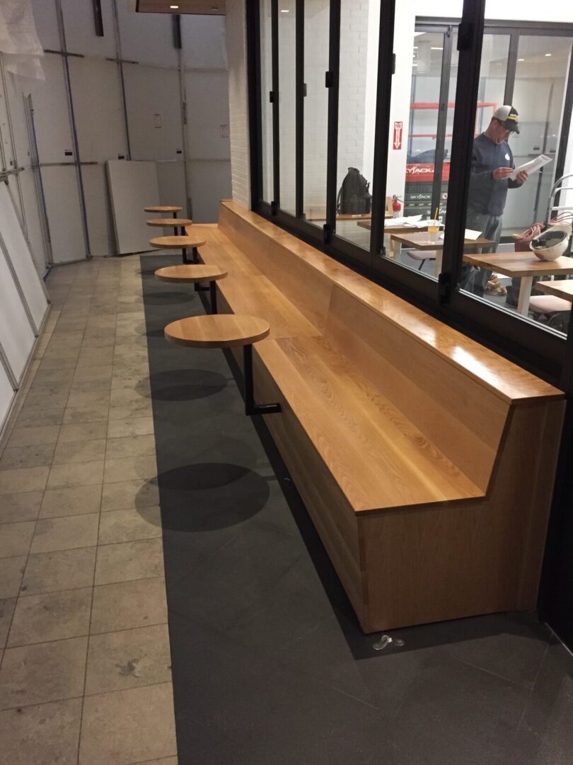 A Wooden Table With Benches for Seating
